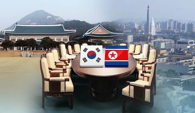 This undated composite image, provided by Yonhap News TV, shows the flags of South Korea (L) and North Korea.