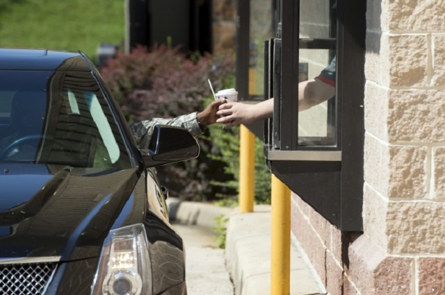 Drive-thru systems, allowing people to buy goods or receive services without leaving their cars, have been gaining increasing popularity, as more and more people are reluctant to make direct contact with others amid the COVID-19 scare. (Yonhap)