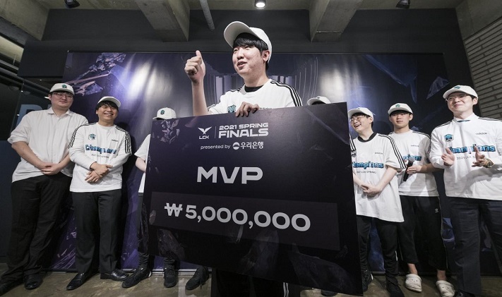 This file photo, provided by League of Legends Champions Korea (LCK) on April 11, 2021, shows Kim Dong-ha, better known by his gaming name "Khan," of Damwon Kia posing for a photo after he was named the MVP of the LCK Spring Finals.
