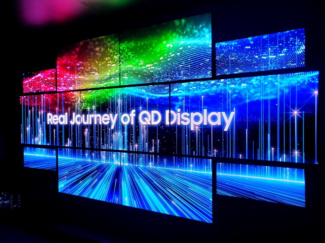 The photo provided by Samsung Display Co. on Jan. 5, 2022, shows its QD display panels on display at Encore At Wynn in Las Vegas.