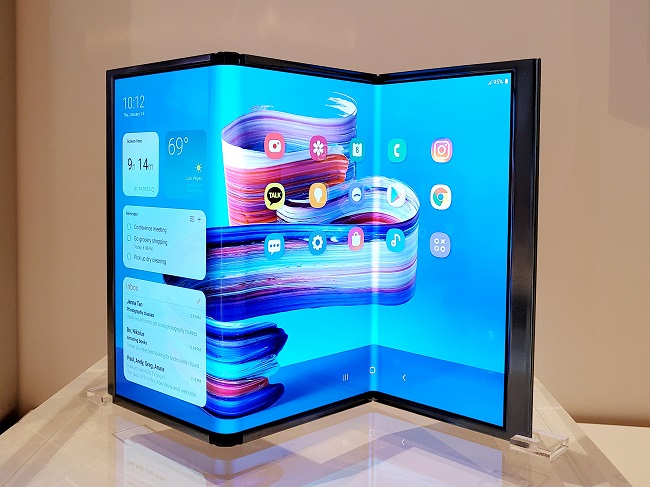 The photo provided by Samsung Display Co. on Jan. 4, 2022, shows its QD display, Flex S, on display at Encore At Wynn in Las Vegas.