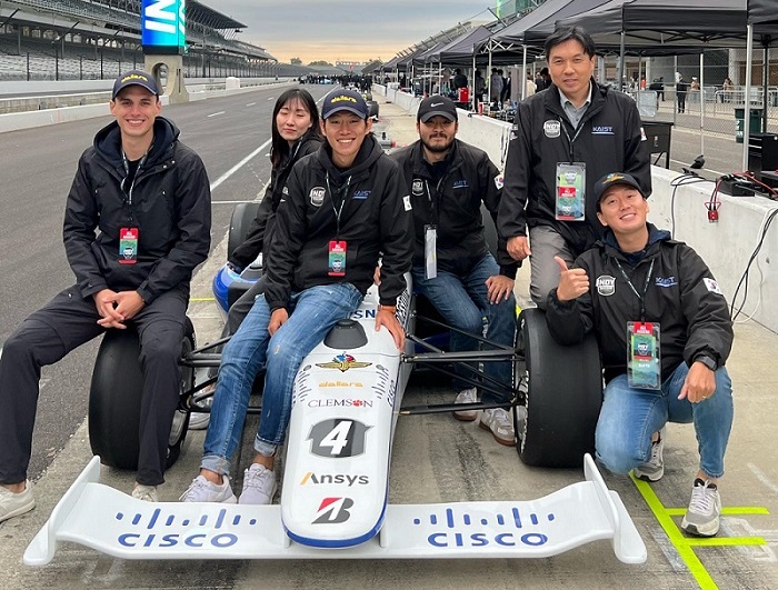 The photo provided by the Korea Advanced Institute of Science and Technology (KAIST) on Dec. 9, 2021, shows members of the Unmanned Systems Research Group when they participated in the Indy Autonomous Challenge (IAC), which took place on the Indianapolis Motor Speedway in Indiana on Oct. 23, 2021.