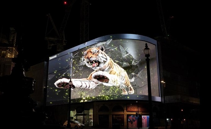 This photo, provided by Samsung Electronics Co. on Feb. 4, 2022, shows the tech giant's three-dimensional outdoor ad at Piccadilly Circus in London for the upcoming Samsung Galaxy Unpacked 2022. Such promotion was arranged in major cities around the globe ahead of the virtual event on Feb. 9, the company said.