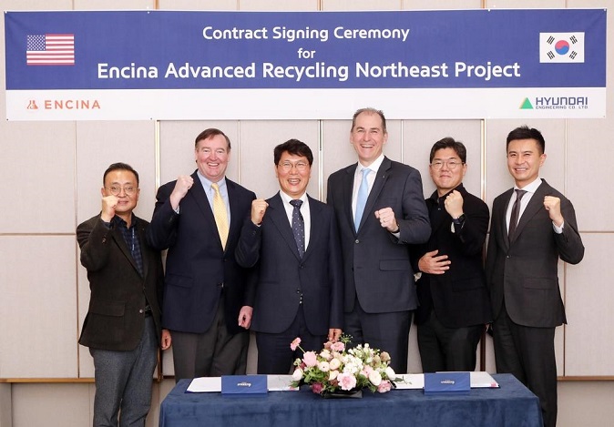 This undated file photo provided by Hyundai Engineering shows officials from Encina and Hyundai Engineering pose for a photo after signing the FEED deal to build a plastic waste processing plant in the U.S.