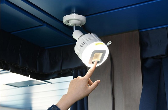 This photo provided by Hyundai Samho Heavy Industries Co. shows a virus-killing lamp inside the vessel.