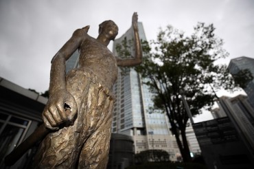 ‘Comfort Women’ Sculptor Couple Wins Libel Suit Against Internet Media Chief