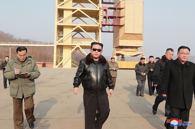 North Korean leader Kim Jong-un visits the Sohae Satellite Launching Ground on the country's west coast, in this photo released on March 11, 2022 by the North's official Korean Central News Agency. (Yonhap)