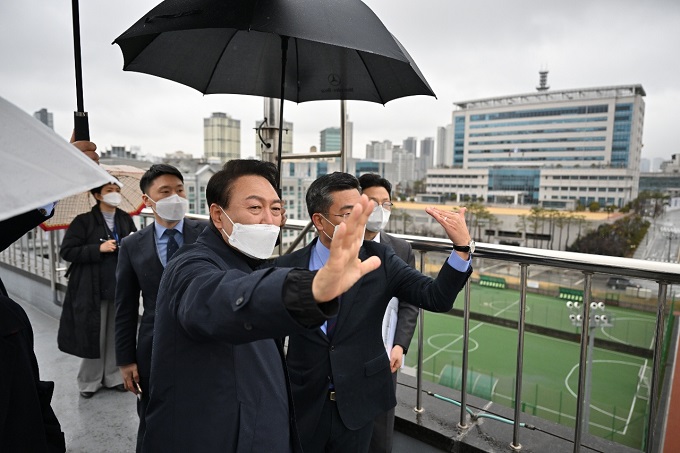 President-elect Yoon Seok-yeol looks around the defense ministry complex in Seoul on March 19, 2022, in this photo released by his People Power Party.