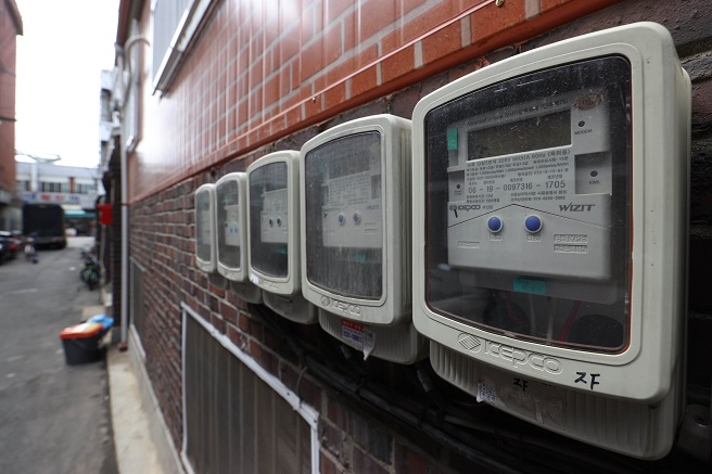 This file photo, taken March 20, 2022, shows electric meters set up in a residential area in Seoul. (Yonhap)