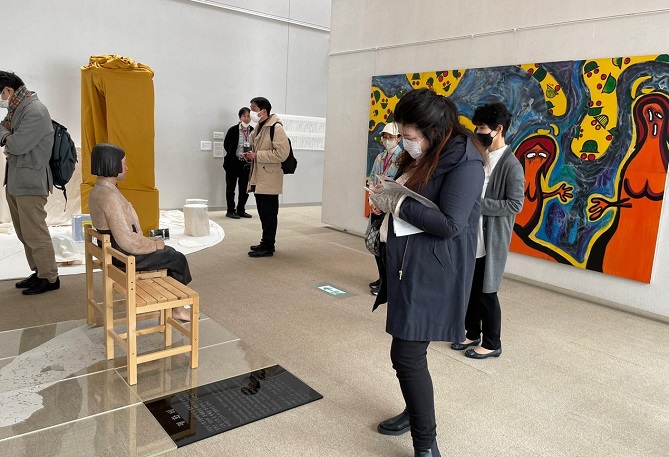 Visitors to "Non-Freedom of Expression Exhibition" that opened on April 2, 2022, in Kunitachi, Tokyo Prefecture, appreciate artworks, including "The Statue of Peace," a statue symbolizing sexual slavery of the Japanese military during World War II.(Yonhap)