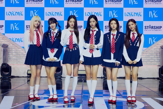 K-pop girl group Ive poses for photographers during an online media showcase in Seoul for its second single album "Love Dive" on April 5, 2022, in this photo provided by Starship Entetainment.