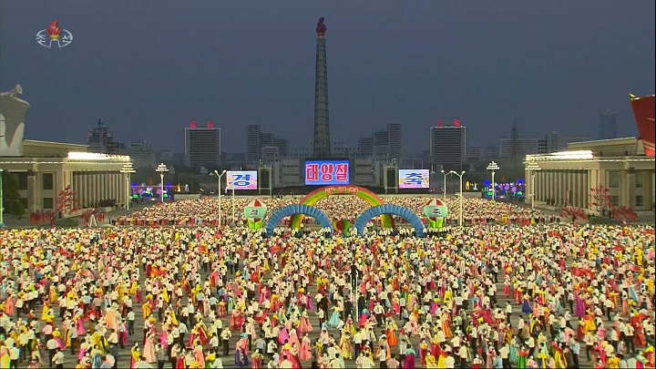 This image from North Korea's Korean Central Television shows students dancing at Kim Il-sung Square in Pyongyang on April 15, 2022, during an event to celebrate the 110th birth anniversary of late national founder Kim Il-sung. (Yonhap)