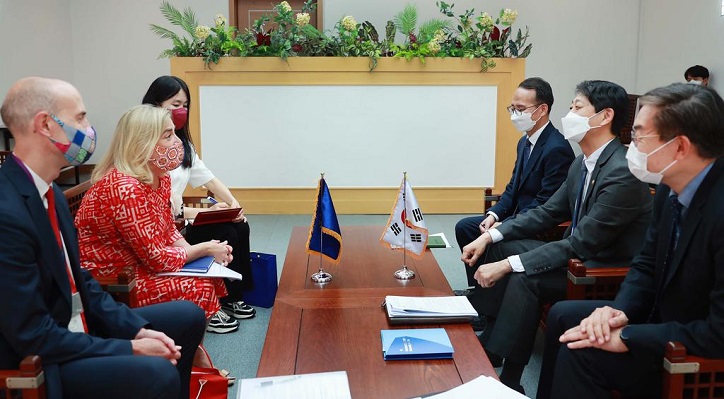 South Korean Trade Minister Ahn Duk-geun (2nd from R) talks with European Union Ambassador to South Korea Maria Castillo-Fernandez (2nd from L) at the government complex in Seoul on May 27, 2022, in this photo provided by the trade ministry.
