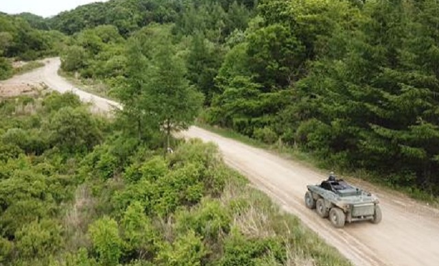 This photo released by the Agency for Defense Development (ADD) on May 23, 2022, shows a military vehicle running at an undisclosed location with new self-driving technology. 
