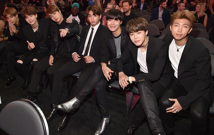 K-pop group BTS poses for photographers during the 2017 Billboard Music Awards, in this photo captured from the Twitter account of the event.