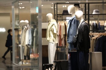 Suits and Camera Sales on the Rise as Gov’t Drops Social Distancing Rules