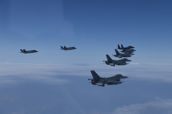 South Korea and the U.S. engage in an air power demonstration, involving F-35A radar-evading fighters, over the Yellow Sea on June 7, 2022, in this photo released by the South's Joint Chiefs of Staff.