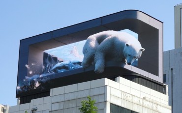 Large Polar Bear Appears on Billboard in Downtown Seoul