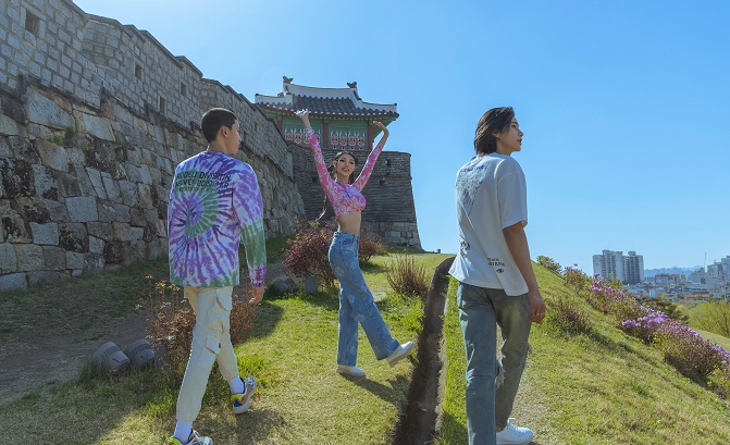 This image provided by the Cultural Heritage Administration shows three virtual influencer siblings -- Ho, Gon and Heil -- in a scene from a video promoting tourism to Hwaseong Fortress in Suwon, some 35 kilometers south of Seoul.