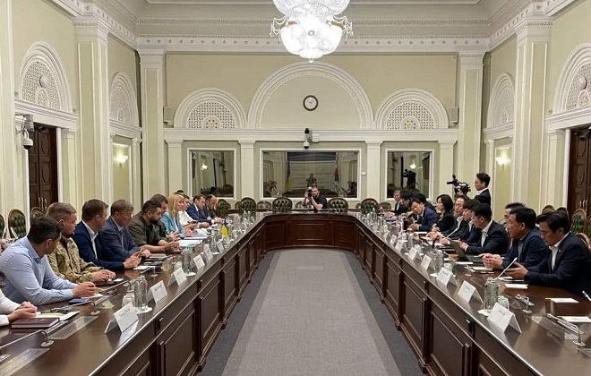This photo, captured from the Facebook account of Lee Jun-seok, head of South Korea's ruling People Power Party on June 7, 2022, shows Lee meeting Ukrainian President Volodymyr Zelenskyy and Ukrainian presidential office officials on June 6, 2022.