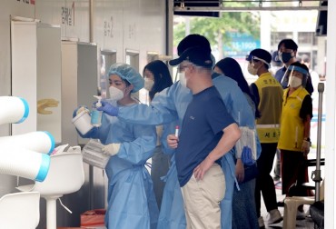 S. Korea’s New Virus Cases Under 70,000 for 3rd Day, Remain High as Subvariant Spreads