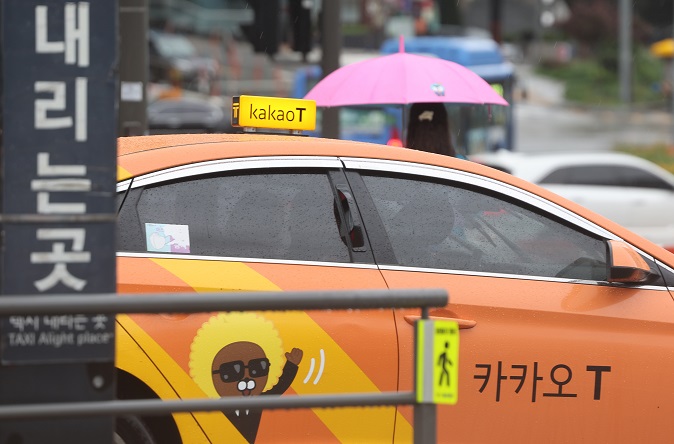 This undated file photo shows a Seoul taxi affiliated with Kakao Mobility. (Yonhap)