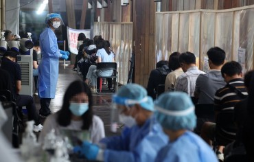 S. Korea’s New COVID-19 Cases Below 100,000 amid Virus Slowdown