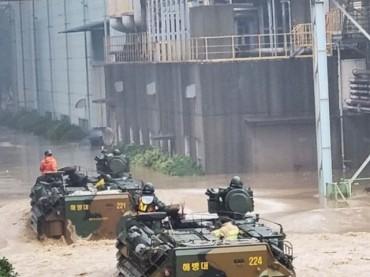 Marine Corps Rescues Flood Victims with Armored Vehicles