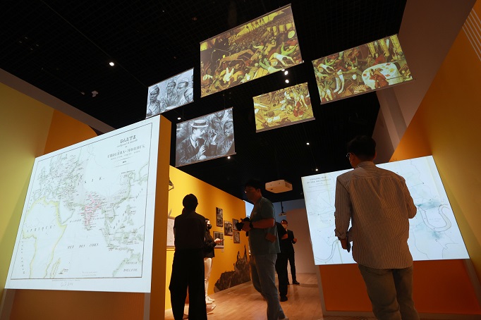 Visitors look at displays during a special exhibition titled "Re-connect: Until Everyone Is Safe" at the National Museum of Korean Contemporary History in central Seoul on Sept. 7, 2022. The exhibition to mark the museum's 10th anniversary runs from Sept. 8 to Jan. 31. (Yonhap)