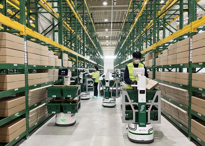 A robot developed by LG Electronics Inc. is carrying parcels at a distribution center in South Korea in this photo provided by the company on Oct. 16, 2022.