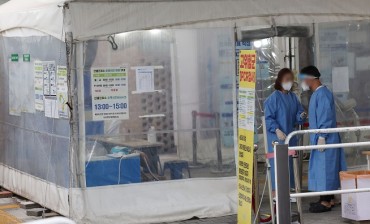 S. Korea’s New COVID-19 Cases Fall to Nearly 10,000 amid Virus Slowdown