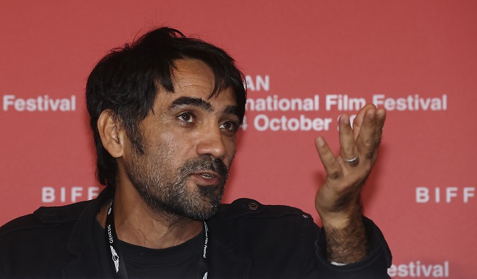 Iranian director Hadi Mohaghegh talks during a press conference after the screening of "Scent of Wind," the opening film of the 27th Busan International Film Festival, in the southeastern port city of Busan on Oct. 5, 2022. (Yonhap)