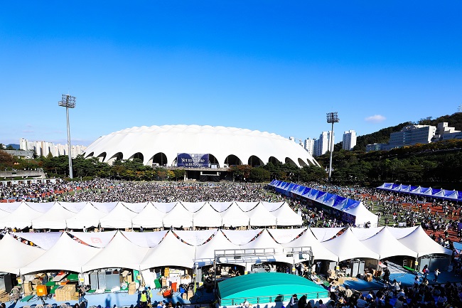The vicinity of the Busan Asiad Main Stadium is crowded with fans waiting to enter the stadium for BTS' concert on Oct. 15, 2022, in this file photo provided by BigHit Music. 