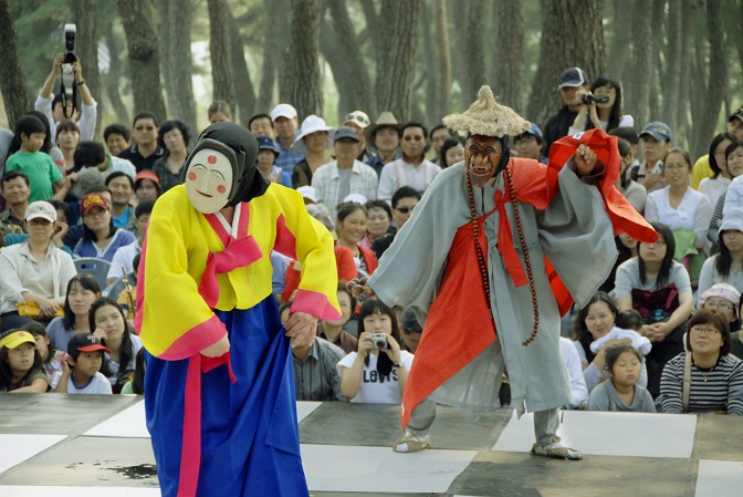 This undated photo provided by the Cultural Heritage Administration shows dancers performing a traditional Korean mask dance.