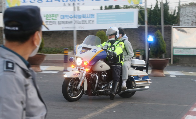 Police Halt Motorcycle Escorts for College Entrance Exam Takers