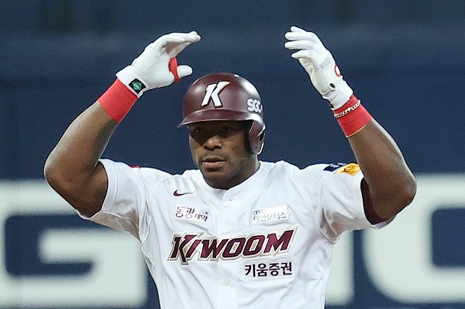 Yasiel Puig of the Kiwoom Heroes celebrates after hitting a double against the SSG Landers during the bottom of the sixth inning of Game 3 of the Korean Series at Gocheok Sky Dome in Seoul on Nov. 4, 2022. (Yonhap)
