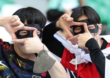 S. Korean Fans Descend on Qatar in Black Masks to Cheer on Sonny, Taegeuk Warriors