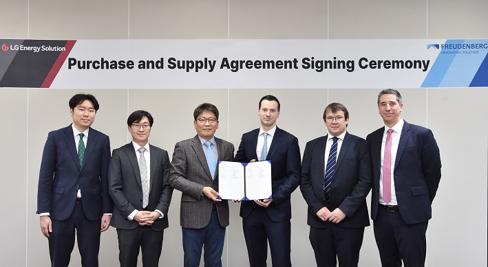 Officials of LG Energy Solution Ltd. (LGES) and Freudenberg E-Power Systems pose for photos after signing a supply agreement on battery modules, in this photo provided by LGES on Feb. 2, 2023.
