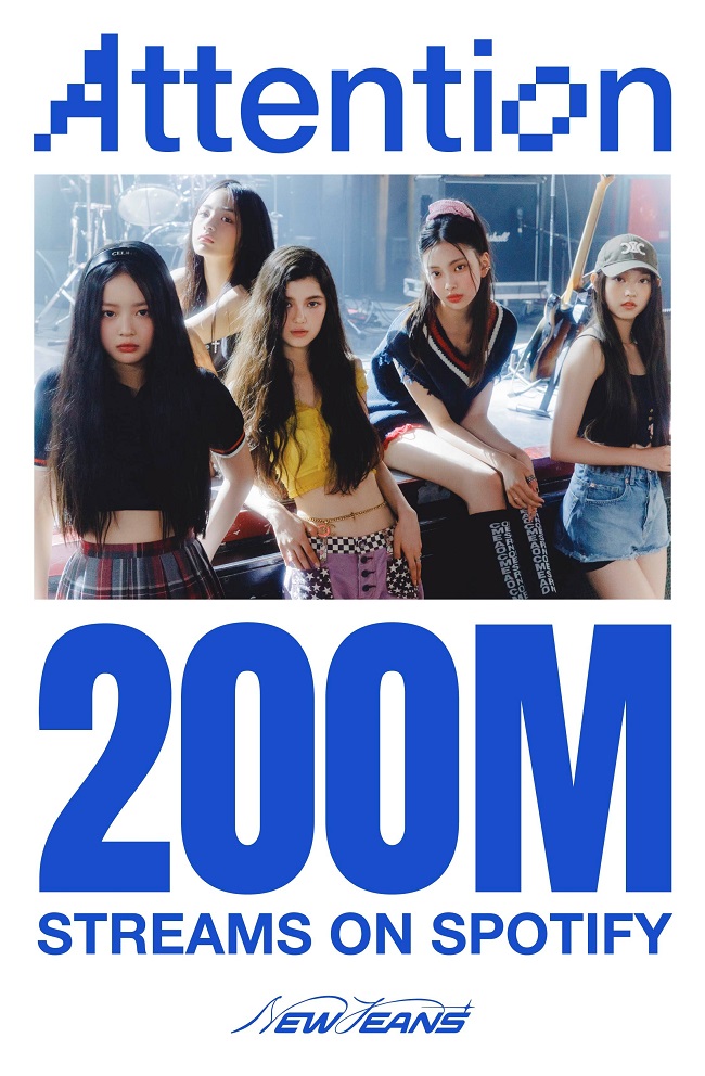 This image provided by K-pop label ADOR on March 28, 2023, celebrates its girl group NewJeans topping 200 million streams on Spotify with "Attention." 