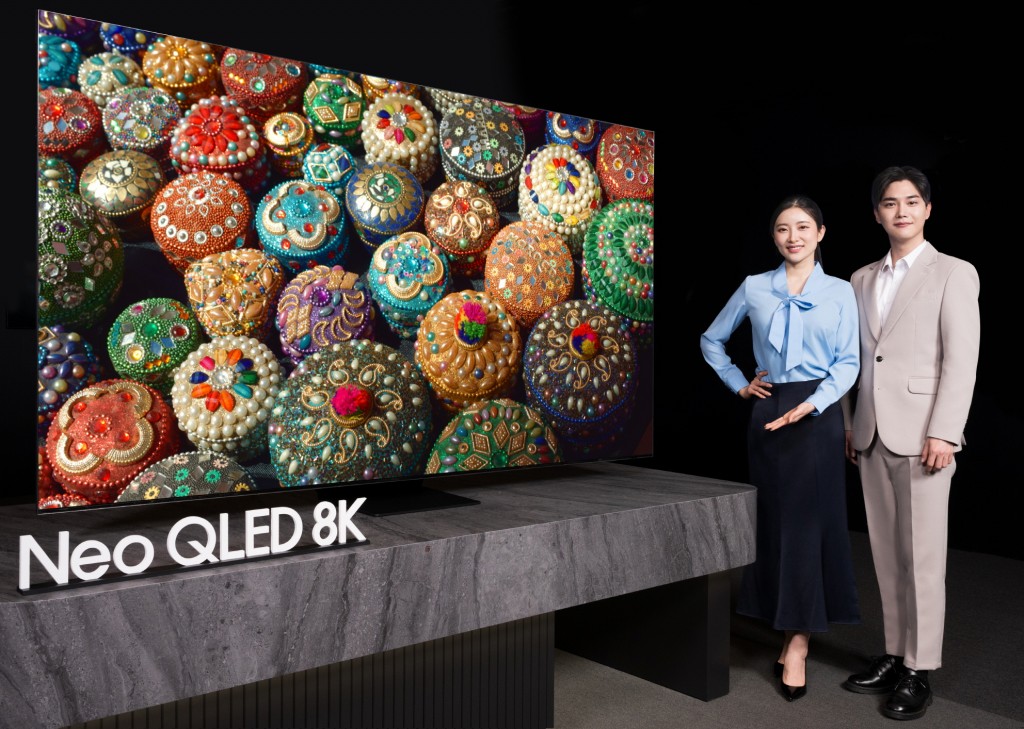 Samsung Electronics officially launched its new 2023 TVs, including Neo QLED and OLED, in the local market. In the picture, models are introducing the Neo QLED 8K 2023. (Image courtesy of Samsung Elecs)