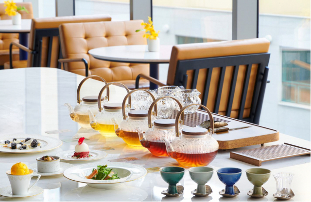 This image provided by Le Meridien Seoul, Myeongdong, shows teas and desserts prepared by the hotel.