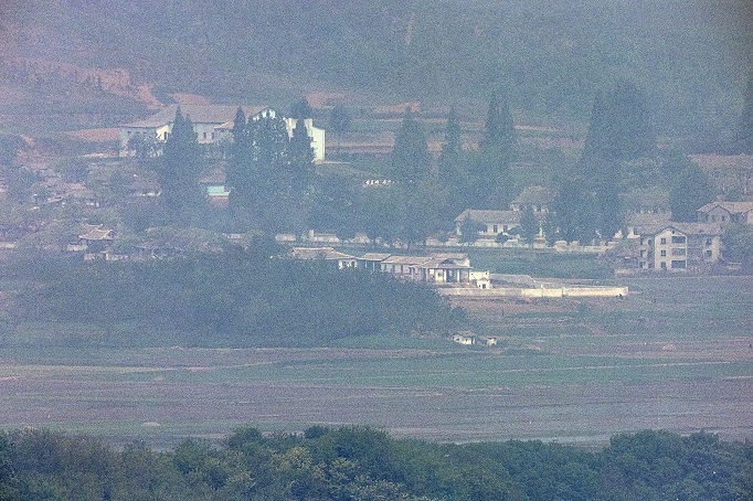 This photo, taken from an observatory in the South Korean border city of Paju on May 10, 2023, shows a village in the North Korean town of Kaepung on the western front-line border with South Korea. (Yonhap)