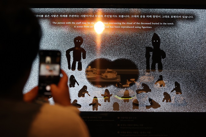 LG Display Co.'s transparent OLED-based display is seen at an exhibition at the National Museum of Korea in Seoul on May 25, 2023. (Yonhap)