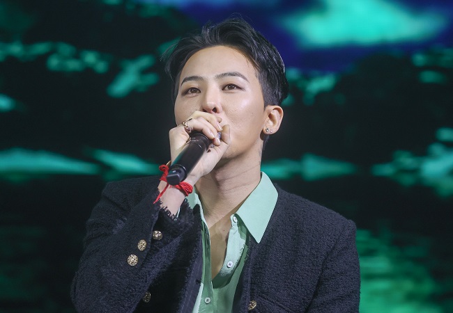 G-Dragon speaks during a promotion event held in Seoul, in this file photo taken March 28, 2023. (Yonhap)