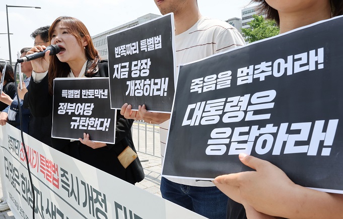 Victims of a massive home rental scam scandal hold a news conference in central Seoul on May 26, 2023, calling for government support measures. (Yonhap)