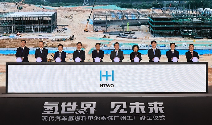 This photo taken on June 1, 2023, and provided by Hyundai Motor Group shows Hyundai Motor President and Chief Executive Officer Chang Jae-hoon (5th from right) and other Hyundai executives and officials from the Guangdong Province attending the completion ceremony of the HTWO Guangzhou hydrogen fuel-cell systems plant. 