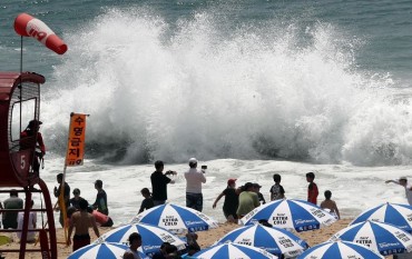 Beachgoers Banned from Entering Haeundae Beach Due to Rip Current