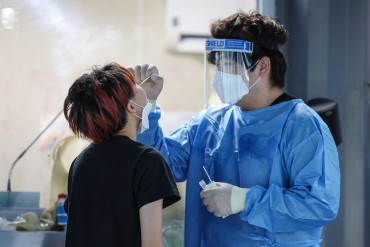S. Korea Postpones Plan to Ease Virus Curbs amid Recent COVID-19 Surge
