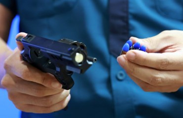 Introducing “Less Lethal” Handguns: Enhancing Police Safety and Accountability