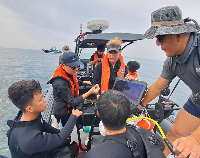 This photo, provided by South Korea's defense ministry on Sept. 22, 2023, show divers from the ministry and the U.S. Forces Korea and the Defense POW/MIA Accounting Agency taking part in an underwater search to recover the remains of U.S. soldiers killed during the 1950-53 Korean War. (Image courtesy of Yonhap News)